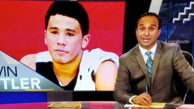 ESPN accidentally uses Devin Booker photo on Notre Dame report.