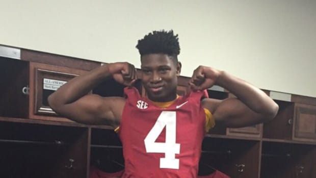 Four-star linebacker Christopher Allen poses in an Alabama jersey.