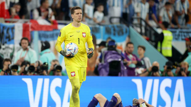 DOHA, QATAR - NOVEMBER 30: Wojciech Szczesny of Poland looks on after fouling Lionel Messi of Argentina during the FIFA World Cup Qatar 2022 Group C match between Poland and Argentina at Stadium 974 on November 30, 2022 in Doha, Qatar. (Photo by Adam Pretty - FIFA/FIFA via Getty Images)