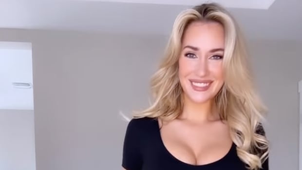 Paige Spiranac trying on some golf outfits.