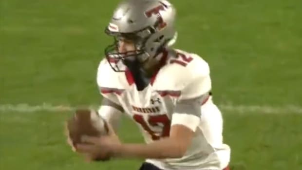 Eighth-grade quarterback Trent Seaborn in action.