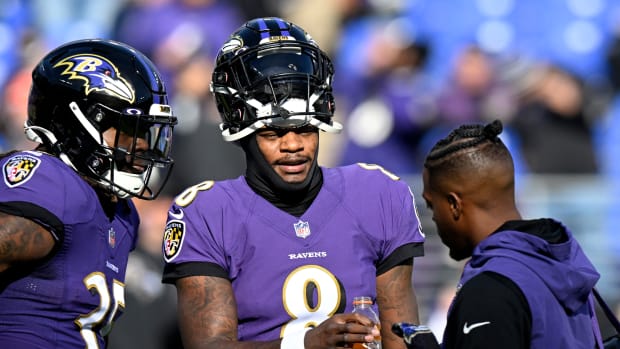 Lamar Jackson of the Baltimore Ravens gets looked at.