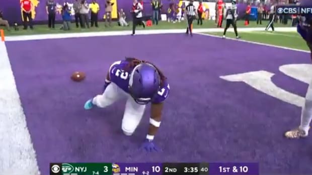 Vikings player with an "all time" touchdown celebration.