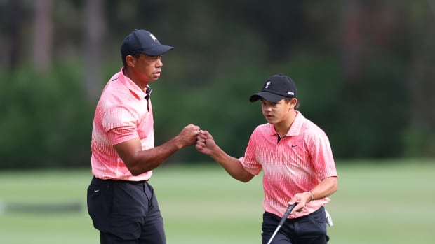 Tiger and Charlie Woods at the PNC Championship. (Photo by Mike Ehrmann/Getty Images)