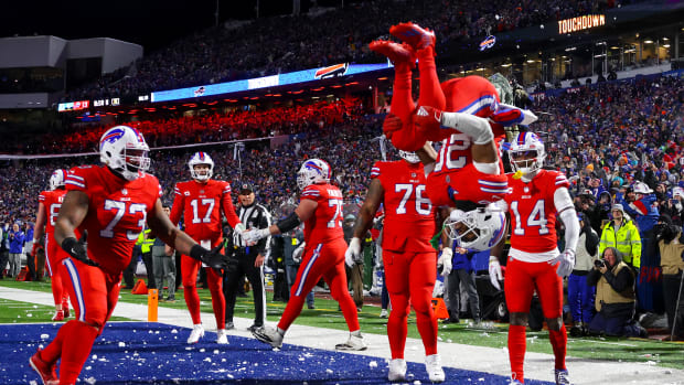 ORCHARD PARK, NEW YORK - DECEMBER 17: Nyheim Hines #20 of the Buffalo Bills celebrates after scoring a touchdown  against the Miami Dolphins during the second quarter of the game at Highmark Stadium on December 17, 2022 in Orchard Park, New York. (Photo by Timothy T Ludwig/Getty Images)