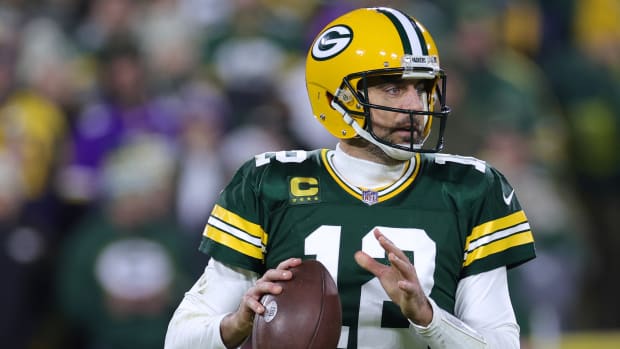 Green Bay Packers quarterback Aaron Rodgers on the field.