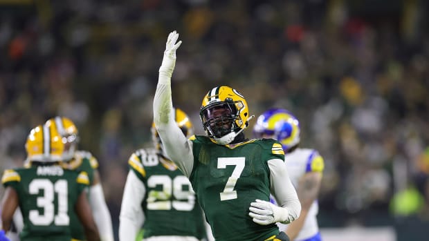 Quay Walker of the Green Bay Packers reacts to a defensive stop against the Rams.