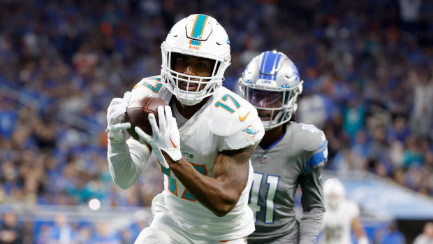 Jaylen Waddle of the Dolphins catches a touchdown pass against the Detroit Lions.