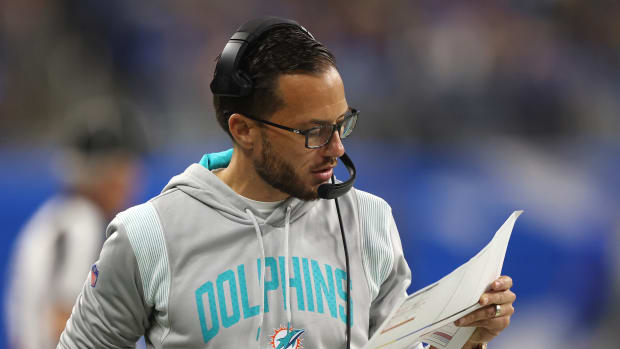 Dolphins head coach Mike McDaniel calling a play against the Detroit Lions.