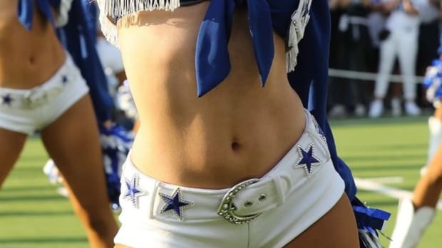 Cowboys cheerleader going viral before kickoff.