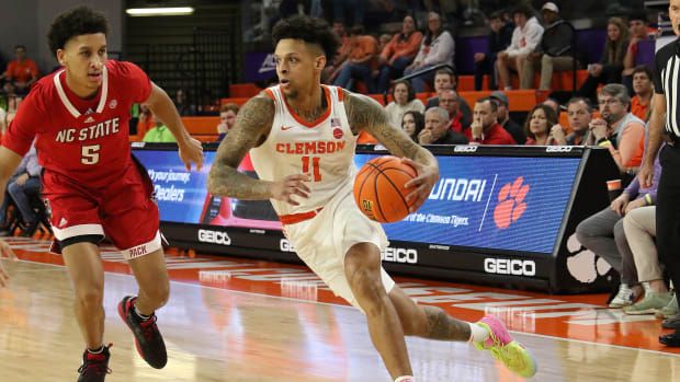 Clemson guard Brevin Galloway drives the ball against NC State.