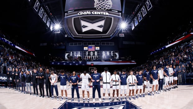 CINCINNATI, OH - DECEMBER 08: General view as the Xavier Musketeers line up for the national anthem prior to a college basketball game against the Ball State Cardinals on Dec. 8, 2021 at Cintas Center in Cincinnati, Ohio. (Photo by Joe Robbins/Icon Sportswire via Getty Images)