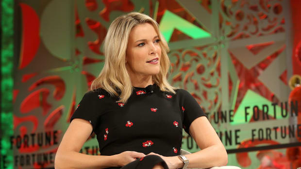 Megyn Kelly speaking at a women's event.