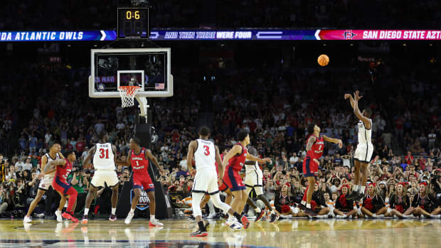 Lamont Butler of San Diego State makes a buzzer-beater to beat FAU 72-71 in the Final Four.
