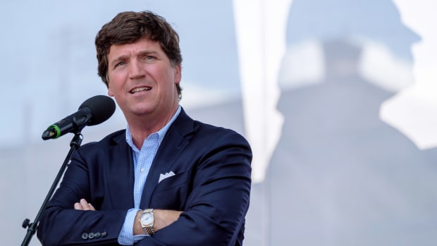 Tucker Carlson of Fox News at a speaking event.