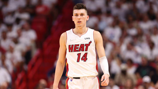 MIAMI, FLORIDA - MAY 19: Tyler Herro #14 of the Miami Heat reacts against the Boston Celtics in Game Two of the 2022 NBA Playoffs Eastern Conference Finals at FTX Arena on May 19, 2022 in Miami, Florida. NOTE TO USER: User expressly acknowledges and agrees that, by downloading and or using this photograph, User is consenting to the terms and conditions of the Getty Images License Agreement. (Photo by Michael Reaves/Getty Images)