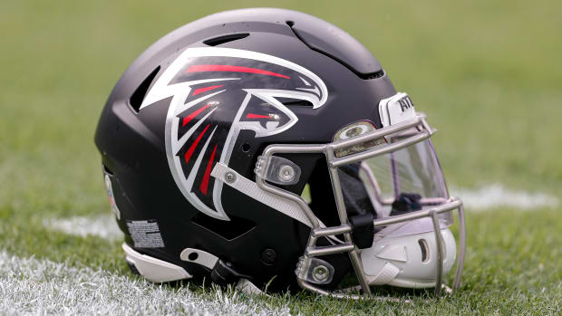 JACKSONVILLE, FL - NOVEMBER 28: A general view of the Atlanta Falcons Helmet on the ground before the game against the Jacksonville Jaguars at TIAA Bank Field on November 28, 2021 in Jacksonville, Florida. The Falcons defeated the Jaguars 21 to 14. (Photo by Don Juan Moore/Getty Images)