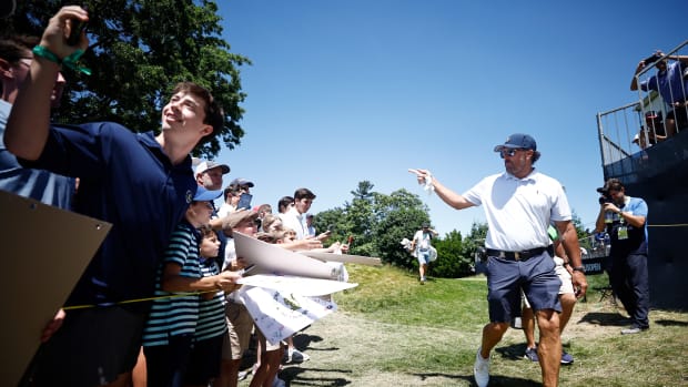 BROOKLINE, MASSACHUSETTS - JUNE 15: Phil Mickelson of the United States walks by fans to the 18th hole during a practice round prior to the 122nd U.S. Open Championship at The Country Club on June 15, 2022 in Brookline, Massachusetts. (Photo by Jared C. Tilton/Getty Images)