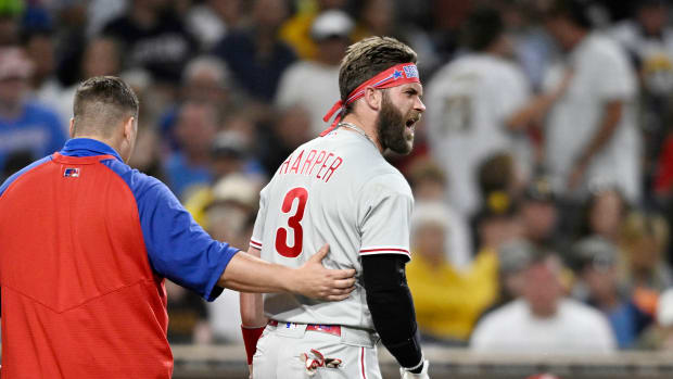 SAN DIEGO, CA - JUNE 25:  Bryce Harper #3 of the Philadelphia Phillies yells at Blake Snell #4 of the San Diego Padres after being hit with a pitch during the fourth inning of a baseball game June 25, 2022 at Petco Park in San Diego, California. (Photo by Denis Poroy/Getty Images)