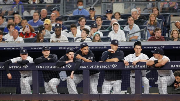 NEW YORK, NEW YORK - JUNE 16: The New York Yankees look on from the dugout during the eighth inning against the Tampa Bay Rays at Yankee Stadium on June 16, 2022 in the Bronx borough of New York City. (Photo by Sarah Stier/Getty Images)