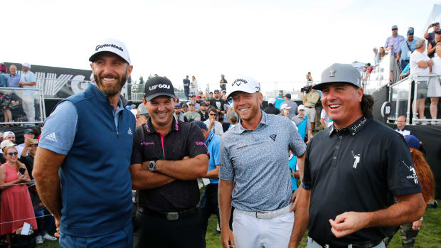 NORTH PLAINS, OREGON - JULY 02: (L-R) Team Captain Dustin Johnson, Patrick Reed, Talor Gooch and Pat Perez of 4 Aces GC smile on the 18th green after winning the team competition during day three of the LIV Golf Invitational - Portland at Pumpkin Ridge Golf Club on July 02, 2022 in North Plains, Oregon. (Photo by Jonathan Ferrey/LIV Golf via Getty Images)