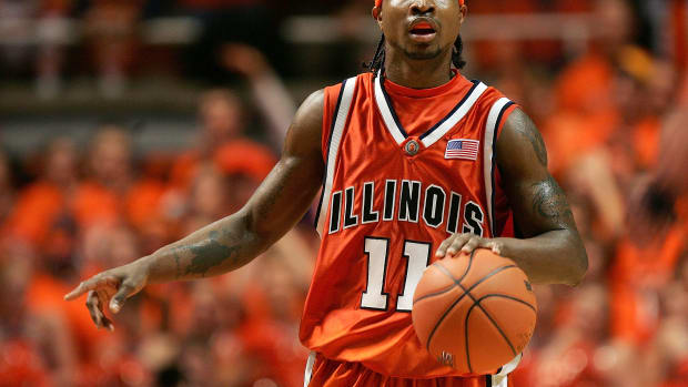CHAMPAIGN, IL - JANUARY 05:  Dee Brown #11 of the Illinois Fighting Illini brings the ball upcourt on his way to a career high 34 points against the Michigan State Spartans on January 5, 2006 in the Assembly Hall at the University of Illinois in Champaign, Illinois. Illinois defeated Michigan State 60-50.  (Photo by Jonathan Daniel/Getty Images)