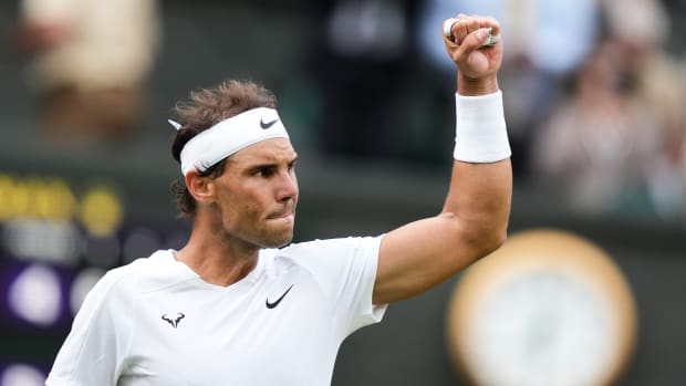 LONDON, ENGLAND - JULY 06: Rafael Nadal of Spain celebrates the victory in the Men's Singles Quarter Finals Match against Taylor Fritz of The United States during day ten of The Championships Wimbledon 2022 at All England Lawn Tennis and Croquet Club on July 06, 2022 in London, England. (Photo by Shi Tang/Getty Images)