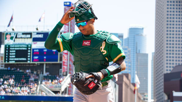 MINNEAPOLIS, MN - MAY 07: Oakland Athletics catcher Christian Bethancourt (23) walks to the dugout during the MLB game between the Oakland Athletics and the Minnesota Twins on May 7th, 2022, at Target Field in Minneapolis, MN. (Photo by Bailey Hillesheim/Icon Sportswire via Getty Images)