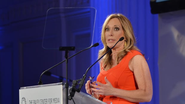 Linda Cohn speaks on stage at the Paley Prize Gala.