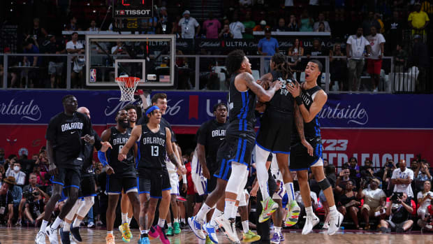 Las Vegas, NV - JULY 9: The Orlando Magic celebrate after winning the game against the Sacramento Kings during the 2022 Las Vegas Summer League on July 9, 2022 at the Thomas & Mack Center in Las Vegas, Nevada. NOTE TO USER: User expressly acknowledges and agrees that, by downloading and/or using this Photograph, user is consenting to the terms and conditions of the Getty Images License Agreement. Mandatory Copyright Notice: Copyright 2022 NBAE (Photo by Bart Young/NBAE via Getty Images)