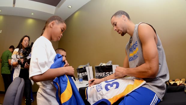 Steph Curry on a visit for Make A Wish Foundation.