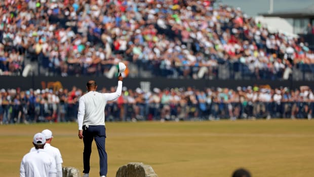 Tiger Woods tips his cap on the final hole of The Open Championship.