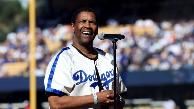 LOS ANGELES, CA - JULY 19:  Denzel Washington leads a tribute to Jackie Robinson prior to the 92nd MLB All-Star Game presented by Mastercard at Dodger Stadium on Tuesday, July 19, 2022 in Los Angeles, California. (Photo by Mary DeCicco/MLB Photos via Getty Images)