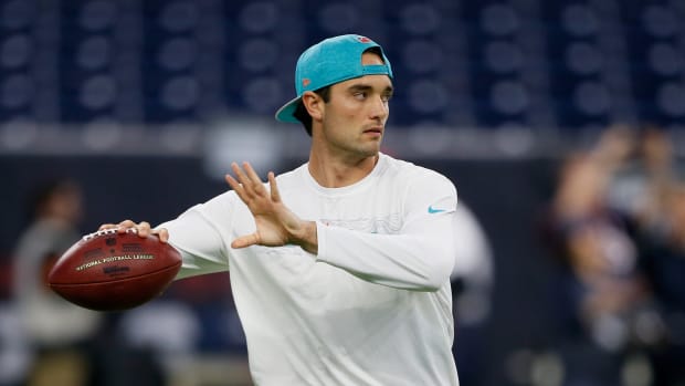 HOUSTON, TX - OCTOBER 25:  Brock Osweiler #8 of the Miami Dolphins warms up before a football game against the Houston Texans at NRG Stadium on October 25, 2018 in Houston, Texas.  (Photo by Bob Levey/Getty Images)