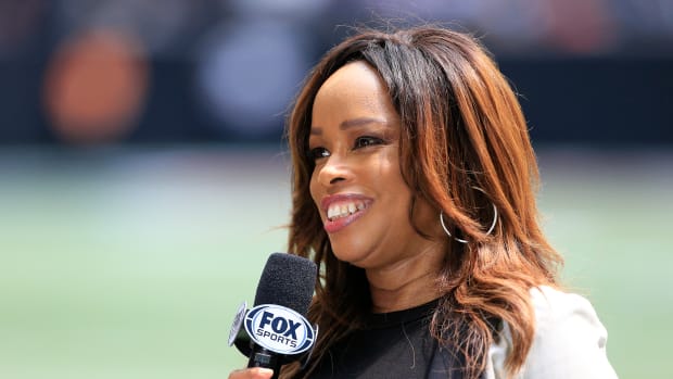 ATLANTA, GA - SEPTEMBER 12:  Pam Oliver of Fox Sports broadcasts from the sidelines during the 2021 Week 1 NFL game between the Atlanta Falcons and the Philadelphia Eagles on September 12, 2021 at Mercedes-Benz Stadium in Atlanta, Georgia.  (Photo by David J. Griffin/Icon Sportswire via Getty Images)