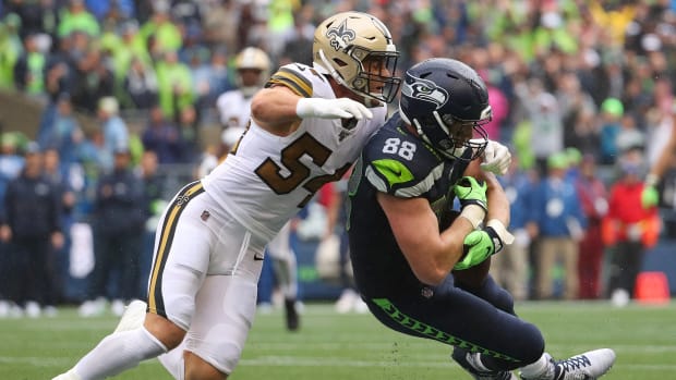 Kiko Alonso tackles a Seahawks player while playing for the Saints.