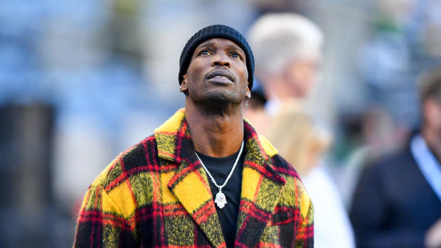 SEATTLE, WASHINGTON - DECEMBER 29: Former NFL wide receiver Chad Johnson looks at the scoreboard before the game between the Seattle Seahawks and the San Francisco 49ers at CenturyLink Field on December 29, 2019 in Seattle, Washington. (Photo by Alika Jenner/Getty Images)