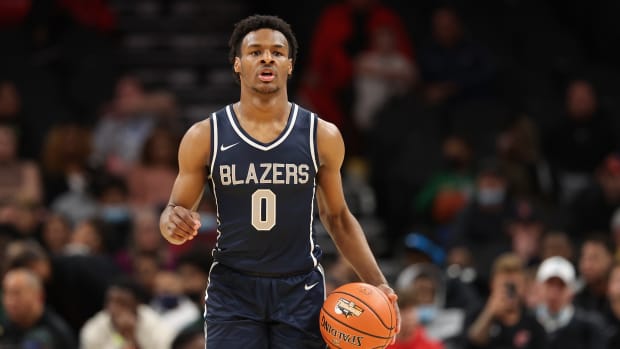 PHOENIX, ARIZONA - DECEMBER 11: Bronny James #0 of the Sierra Canyon Trailblazers handles the ball during the Hoophall West tournament against the Perry Pumas at Footprint Center on December 11, 2021 in Phoenix, Arizona. (Photo by Christian Petersen/Getty Images)