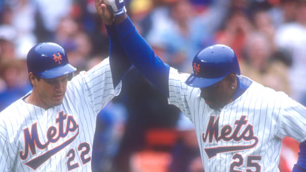 NEW YORK, NY - JULY 06:  Bobby Bonilla #25 of the New York Mets celebrates a homer with Kevin McReynolds"t #22 during a  baseball game against the San Francisco Giants on July 6, 1994 at Shea Stadium in New York City.  (Photo by Mitchell Layton/Getty Images)