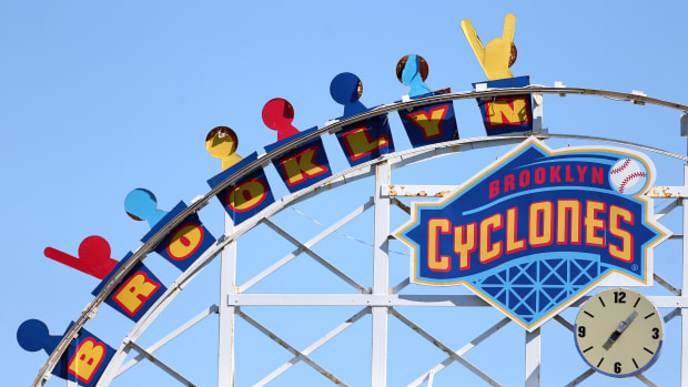 A shot of the Brooklyn Cyclones scoreboard and Coney Island Ferris Wheel.