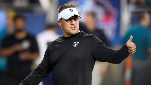 Las Vegas Raiders head coach Josh McDaniels gives a thumbs-up to players prior to the 2022 Pro Hall of Fame Game against the Jacksonville Jaguars.