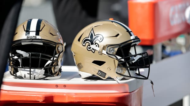 A general shot of two Saints helmets during a game.