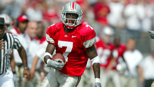 Chris Gamble of the Ohio State Buckeyes carries the ball during a game against the Indiana Hoosiers in 2002.