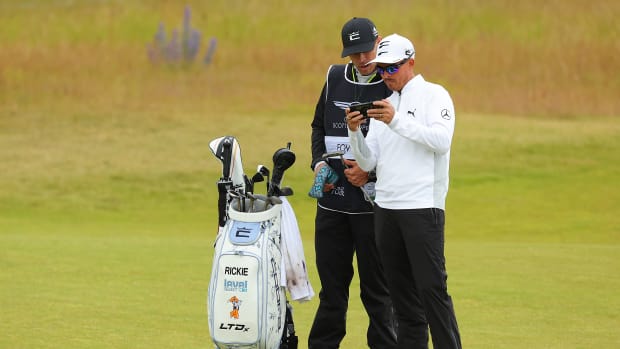 NORTH BERWICK, SCOTLAND - JULY 06: Rickie Fowler of the United States looks on with their Caddie on the 1st hole during a practice round prior to the Genesis Scottish Open at The Renaissance Club on July 06, 2022 in North Berwick, Scotland. (Photo by Kevin C. Cox/Getty Images)