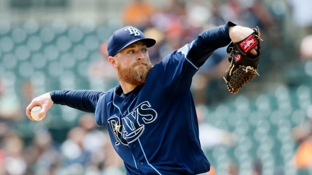 Drew Rasmussen pitches for the Tampa Bay Rays against the Tigers.