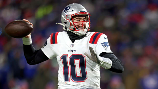 Patriots quarterback Mac Jones throws a pass against the Buffalo Bills in the AFC Wild Card playoff game.