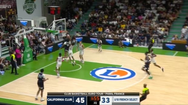 Bronny James throws down a big poster dunk against a French team.