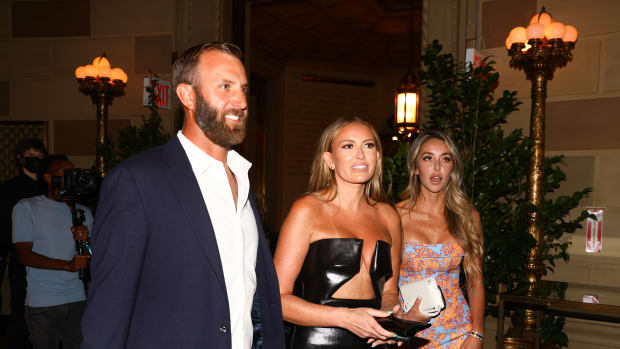 Paulina Gretzky parties with her husband before a LIV Golf event.