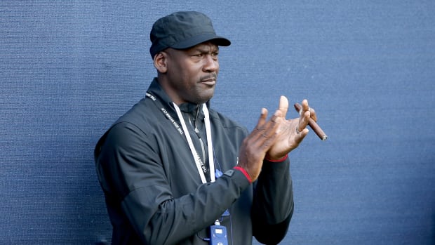 Michael Jordan watches golfers play at the Ryder Cup back in 2014.