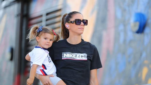 Alex Morgan with her daughter Charlie Elena before a USWNT game.